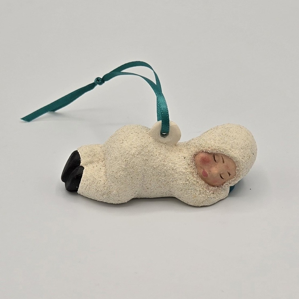 Snow Baby sleeping Christmas ornament EUC